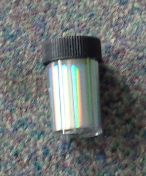 NAIL ART FOIL ON A ROLL. IN GOLD OR SILVER. THE FOIL IS MADE FROM PET AND COMES ON A ROLL CONTAINED WITHIN A PLASTIC SCREW TOP JAR. PAINT NAIL WITH NAIL POLISH. CUT OUT ANY SHAPE YOU REQUIRE OR JUST COVER NAIL WITH THE FOIL. USE THE NAIL ART BRUSH (NOT SUPPLIED) TO SMOOTH THE FOIL DOWN. PUT A TOP LAYER OF NAIL POLISH OVER THE FOIL TO SECURE IT IN PLACE. FOIL IS NOT A PEEL AND STICK ITEM. NAIL POLISH HAS TO BE SEMI DRY FOR FOIL TO ATTACH TO. FOIL IS PRESENTED IN A SCREW TOP PLASTIC BOTTLE FOR STORAGE. SIZE OF ROUND BOTTLE - 3CM DIAMETER X 5CM H. WIDTH AND LENGTH OF FOIL ITSELF 4 CM X 100 CM PER ROLL.