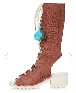 LADIES LEATHER BOOT SANDAL. WITH RUBBER SOLE. BROWN CROCODILE TYPE LEATHER UPPER THAT LACES UP DOWN THE FRONT. COVERS THE ANKLE AND THE CALF. WITH CUT OUT TOES AND HEELS. WITH AN INSOLE LENGTH OF OVER 24CM.