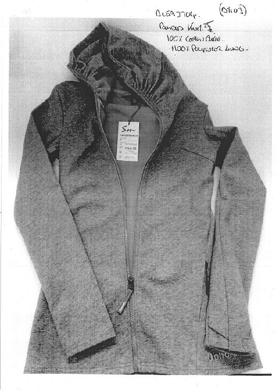 A KNITTED LADIES JACKET. DESIGNED TO COVER THE UPPER PART OF THE BODY FROM THE SHOULDERS TO THE HIPS. WITH BUST DARTS.  WITH A 7 INCH HIGH NECKLINE THAT DOESNT COMPLETELY COVER THE HEAD.. WITH COMPLETE FRONT OPENING FASTENED WITH ZIP.  WITH ZIPPED FRONT POCKETS. GARMENT HEMMED AT BASE AND SLEEVE ENDS. THE GARMENT IS MADE FROM 100% COTTON OUTER WITH POLYESTER BONDED LINING. NOT ELASTICATED AT HEM OR SLEEVES.