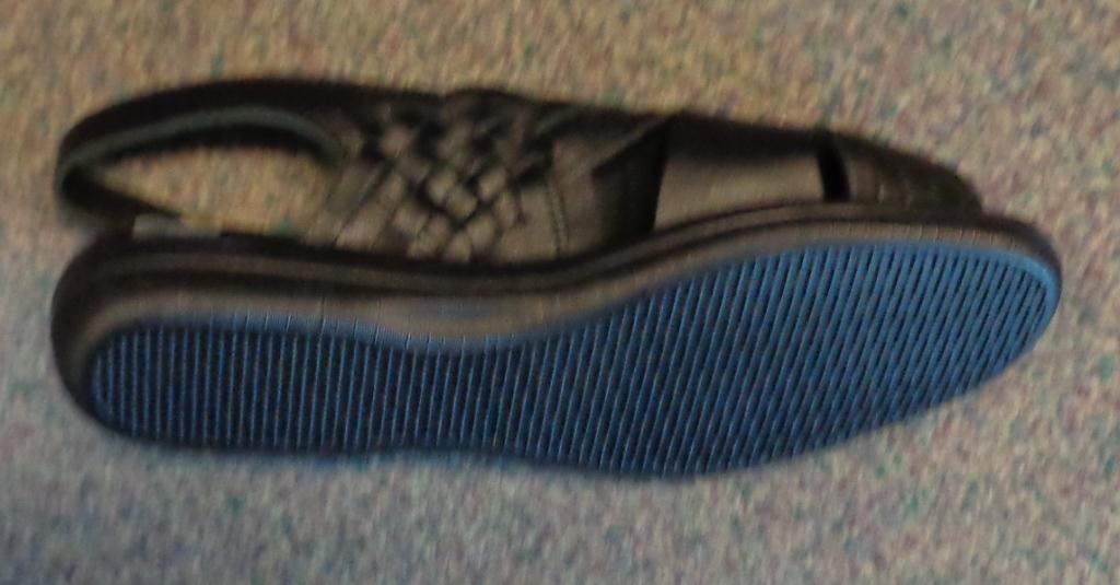 SANDAL WITH UPPERS OF LEATHER AND OUTER SOLES OF PLASTIC, FOR WOMEN. NOT COVERING THE ANKLE. WITH INSOLES OF A LENGTH OF LESS THAN 24 CM, WITH A BUCKLE FASTENING ON THE SIDE OF THE STRAP AROUND THE HEEL. WITH WOVEN DETAIL ON THE SANDAL FRONT, WITH A LATTICE DESIGN OF HALF CM STRAPS ON BOTH SIDES. BLACK IN COLOUR, WITH A PADDED INSOLE. AND A HALF INCH WEDGE HEEL.