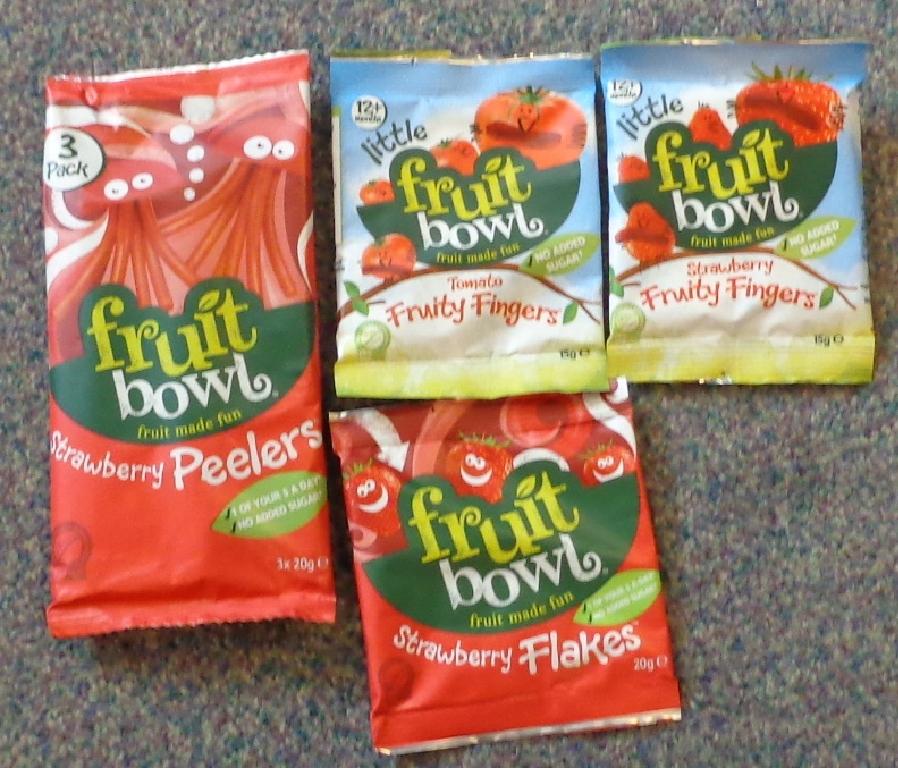 FORMED FRUIT PIECES MADE BY CONCENTRATING FRUIT PUREES AND JUICES . INGREDIENTS CONCENTRATED APPLE PUREE, CONCENTRATED APPLE JUICE, STRAWBERRY PUREE, GLUTEN FREE WHEAT FIBRE, GELLING AGENT. PACKAGED IN 20G PACKS.