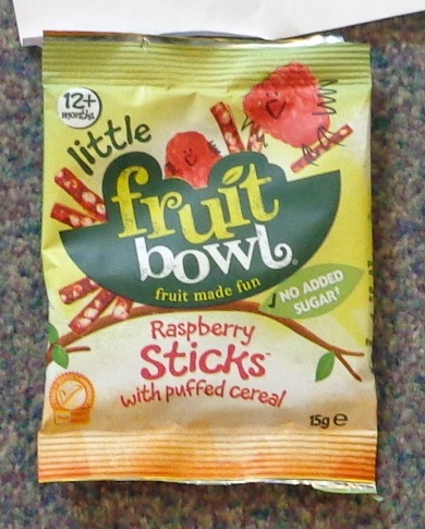 FORMED FRUIT PIECES MADE BY CONCENTRATING FRUIT PUREES AND JUICES WITH ADDITION OF CRISPED CEREALS. INGREDIENTS CONCENTRATED APPLE PUREE, CONCENTRATED APPLE JUICE, RASPBERRY PUREE AND PUFFED MILLET. PACKAGED IN 15G PACKS.