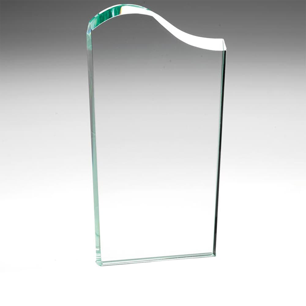 A GLASS TROPHY BLANK MADE FROM FLOAT GLASS. THE ITEM HAS BEEN SHAPED AND EDGE WORKED BUT IS UNFINISHED IN ITS PRESENT FORM. ONCE ENGRAVED, THE ITEM IS GLUED TO A SUITABLE BASE TO FORM THE FINISHED TROPHY.