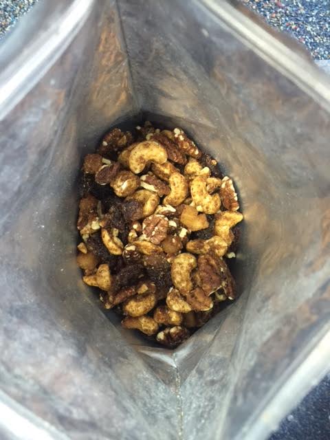 A MIXED 454G BAG OF DRY ROASTED PECAN AND CASHEW NUTS (27.2% PECANS), (25% CASHEWS), 18% DRIED CHERRIES, 15% DRIED APPLES, 4.1% CANE SUGAR, 3.07%TAPIOCA SYRUP, 1.03% WATER, 1.65% BROWN SUGAR, 1.25% SEA SALT, 0.5% CINNAMON, 0.4% NATURAL VANILLA EXTRACT.