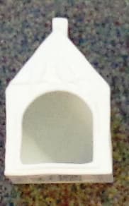 A PORCELAIN  TEALIGHT HOLDER IN THE SHAPE OF A HOUSE. WITH A SHALLOW HOLE FOR PLACING A TEALIGHT CANDLE WITHIN. THE TEALIGHT IS NOT INCLUDED . WHEN THE TEALIGHT IS LIT THE LIGHT SHINES THROUGH THE FRONT OF THE HOUSE. PACKAGED FOR RETAIL SALE.