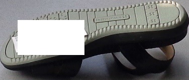 LADIES FOOTWEAR NOT COVERING THE ANKLE. A SANDAL WITH UPPERS OF LEATHER AND A VAMP CONSISTING OF A SINGLE STRAP WITH PIECES CUT OUT AT EITHER SIDE. OUTER SOLE OF RUBBER. OPEN AT THE TOE AREA. SLING BACK HEEL STRAP WITH VELCRO FASTENING. INSOLE LEGTH OF LESS THAN 24CM WITH A HEEL HEIGHT OF LESS THAN 3CM. COLOUR: BLACK VAMP AND HEEL STRAP, BLACK AND TAN COLOUR INTERIOR WITH INSOLE BEARING BRAND LOGO AND DECORATIVE EMBOSSED STYLE PATTERN.