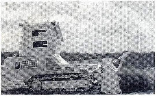 MINE CLEARANCE TRACKED VEHICLE FOR THE EFFECTIVE CLEARANCE OF AP (ANTI PERSONAL) AND AT (ANTI TANK) LANDMINES TO BE USED WITH INTERCHANGABLE ATTACHMENTS.
DIESEL ENGINE.
OPERATOR OR REMOTE CONTROLLED OPERATION (DETACHABLE CABIN)
GROUND PENETRATION TO DEPTH OF 30CM.
CLEARANCE WIDTH 2600CM.
DIMENSIONS (WITHOUT ATTACHMENTS) L 4398MM X W 2300MM X H (WITH CABIN) 3750MM 
WEIGHT (WITHOUT ATTACHMENT) 12760 KG.