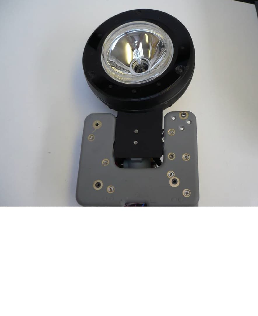 A HELCOPTER LANDING/SEARCH LIGHT.
THE LIGHT PROVIDES A VISIBLE AND INFRA-RED LIGHT SOURCE. 
USED TO REPLACE THOSE ALREADY ON THE HELICOPTER, DUE TO DEFECT OR IMPROVEMENT