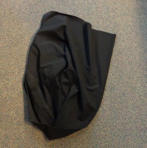 A KNITTED FABRIC OF 72% POLYAMIDE AND 28% ELASTANE. HAS A WIDTH OF 140 CENTIMETRES, AND A WEIGHT OF 153 GRAMMES PER SQUARE METRE. BLACK IN COLOUR.
