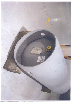 A SPECIALIST CYLINDRICAL TRANSPORT CONTAINER FOR SOLID URANIUM HEXAFLUORIDE SPECIFICALLY DESIGNED AND CONSTRUCTED FOR ATTACHING TO VARIOUS MODES OF TRANSPORT. 
IT IS CONSTRUCTED OF STEEL AND HAS A CAPACITY OF 736 LITRES. 
CONTAINERS OF THIS TYPE ARE REQUIRED FOR THE DOOR-TO-DOOR CARRIAGE OF ENRICHED URANIUM HEXAFLUORIDE, WITH NO INTERMEDIATE REPACKING PERMITTED DUE TO THE NATURE OF THE MATERIALS THAT THE CONTAINER HOLDS. 
THE CONTAINER IS FITTED WITH A STEEL SKIRTS WHICH FACILITATE HANDLING BY ENABLING THE CYLINDER TO BE ATTACHED TO CRANES. 
BEING OF A ROBUST STEEL CONSTRUCTION IT IS INTENDED FOR REPEATED USE ON MULTIPLE MODES OF TRANSPORT, INCLUDING ROAD, RAIL OR SEA. 
THE CONTAINER MAY BE MOUNTED ON A RACK WHERE NECESSARY FOR LOADING ON THE VESSEL, WITH AN ADDITIONAL PROTECTIVE OVERPACK USED WHEN REQUIRED BY NUCLEAR TRANSPORT REGULATIONS.