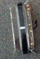 A DARK CHOOLATE, NUT AND SEA SALT BAR. INGREDIENTS : ALMONDS, PEANUTS, DARK CHOOLATE COATING ((INULIN, SUGAR, PALM KERNEL OIL,  COCOA POWDER, WHOLE MILK POWDER, EMULSIFIER (SOYA LECITHIN)