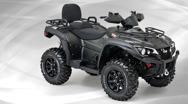AN ALL-TERRAIN VEHICLE FITTED WITH A TWIN CYLINDER PETROL ENGINE WITH A POWER OUTPUT OF 14.8KW. THE VEHICLE HAS A SINGLE SEAT AND ACKERMAN PRINCIPLE STEERING AND HANDLEBARS. THE ATV HAS BRAKES ON ALL 4 WHEELS. THE ATV IS POWERED BY AN AUTOMATIC CLUTCH WITH FORWARD AND REVERSE GEARS AND HIGH AND LOW RATIO GEARS FOR SLOW USE IN DIFFICULT TERRAINS. BOTH THE FRONT AND REAR WHEELS ARE DRIVEN BY INDEPENDENT DRIVE SHAFTS. THE TYRES FITTED ARE SUITABLE FOR HEAVY OFF ROAD USE. THE VEHICLE IS FITTED WITH A TOW HITCH AND 3000LB ELECTRONIC WINCH AS STANDARD FEATURES. THE VEHICLE HAS A DRY WEIGHT OF 380KG AND AN UNBRAKED TOWING CAPACITY OF 894KG.
