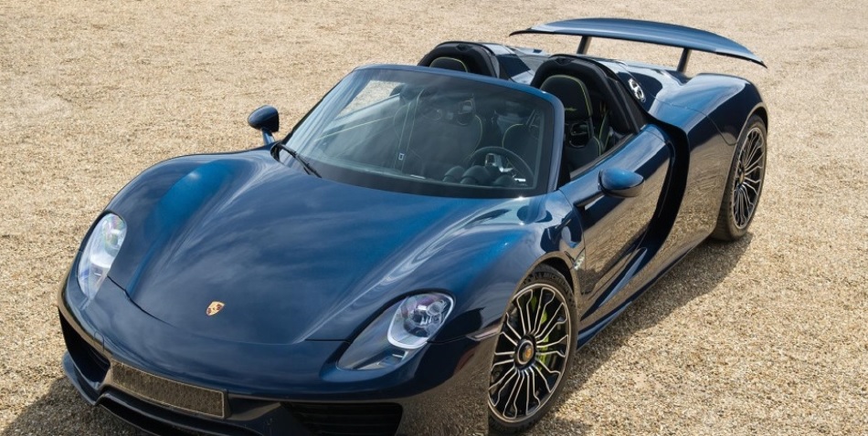 2014 PORSCHE 918 SPYDER MID-ENGINED PLUG-IN HYBRID SPORTS CAR.
BLACK IN COLOUR.
TWO SEATS.
LEFT HAND DRIVE.
4.6 LITRE V8 PLUS ENGINE PLUS 2 X ELECTRIC MOTORS.