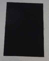FABRIC CONSISTING OF A UNDYED  100% POLYESTER KNITTED MATERIAL THAT HAS BEEN COATED THROUGHOUT WITH ACTIVATED CARBON.  LAMINATED TO ONE SIDE OF THIS IS A BLACK KNITTED POLYAMIDE COMFORT LINER.  

THE ACTIVATED CARBON COATING CAN BE SEEN WITH THE NAKED EYE. 

THE FABRIC HAS A NOMINAL WEIGHT OF 300 GSM AND IS SUPPLIED ON A ROLL OF A NOMINAL WIDTH OF 1.45 METRES.

THE FABRIC IS USED IN THE MANUFACTURE OF UNIFORMS, WARFARE WEAR AND PROTECTIVE EQUIPMENT WITH THE INTENDED FUNCTION OF OFFERING CHEMICAL PROTECTION.