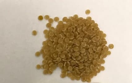 SMALL, ROUND MICROPELLETS WHICH EXPAND BY INTRODUCING HOT AIR PRESSURE, WHICH TURNS THEM INTO A CHIP/CRISP. INGREDIENTS ARE BEAN FLOUR, TAPIOCA STARCH, WHITE RICE FLOUR, AND SALT