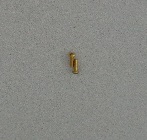 BRASS THREADED SOCKET PIN IN THE STYLE OF A SMALL THREADED SCREW. IT IS A TURNED BRASS PIN WHICH IS THEN THREADED. WITH A ROUND HEAD WITH A SINGLE SLOT IN THE HEAD. IT IS USED TO SECURE FITTINGS TO BOXES. IT IS APPROXIMATELY 1.3 CM LONG INCLUDING THE HEAD.