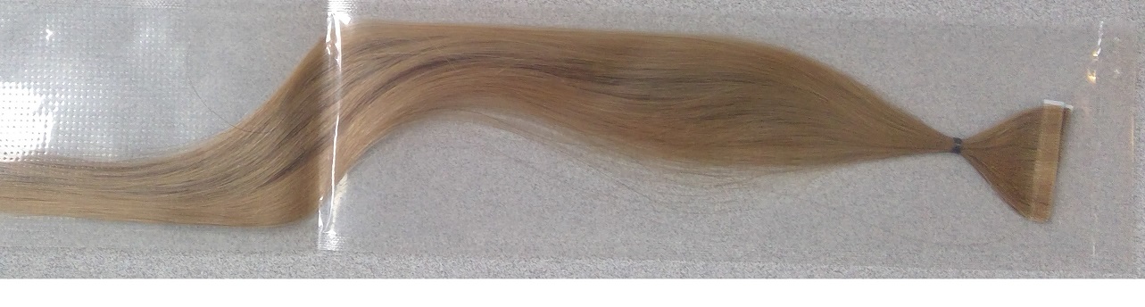 LOOSE HUMAN HAIR BUNDLES THAT HAVE BEEN DRESSED AND PREPARED. THE HAIR HAS BEEN DRESSED, WHERE THE HAIR HAS BEEN ARRANGED SO THAT THE ROOT ENDS AND TIP ENDS ARE RESPECTIVELY TOGETHER. THEY ARE MULTIPLE HAIR STRANDS THAT ARE UNFINISHED UNTIL APPLIED TO THE PERSONS HAIR. THEY ARE APPLIED USING A SPECIFIC SPECIALIST SYSTEM USED BY A TRAINED EXTENSIONIST, THAT SEW THE WEFT PIECES INTO THE PERSONS EXISTING HAIR. THE HAIR BUNDLES ARE MADE OF 100% HUMAN HAIR.