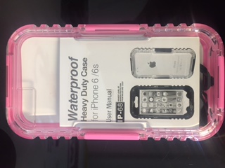 A PROTECTIVE SHELL CASE MADE OF A HARD WATERPROOF PLASTIC. IT IS FOR USE WITH A MOBILE PHONE. IT HAS A HINGE ON ONE EDGE AND THREE SNAP LOCK MECHANISMS ON THE OTHER SIDES. DOES NOT CONTAIN A STRAP OR BELT HOOK AND IS THEREFORE INTENDED TO BE CARRIED IN A HANDBAG OR POCKET. PACKAGED FOR RETAIL SALE IN A POLYPROPYLENE
