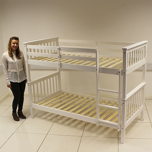 A BED FRAME MADE FROM SOLID PINE WITH A TRADITIONAL SUBTLE WHITE FINISH. THE BED FEATURES SOLID WOOD AND SLATTED BASE AND INCLUDES HEADBOARD AND MID FOOT END. CAN BE USED AS A BUNK BED OR TWO SINGLES. FLAT PACKED, ASSEMBLY REQUIRED. MATTRESS IS NOT INCLUDED.