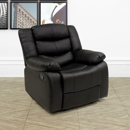 A RECLINING ARM CHAIR. WITH A METAL FRAME AND COVERED IN BONDED LEATHER, IT IS FILLED WITH A DENSE FOAM. IT HAS A 3 POSITION RECLINE OF UPRIGHT, SEMI-RECLINE AND FULL RECLINE/SLEEP POSITION.