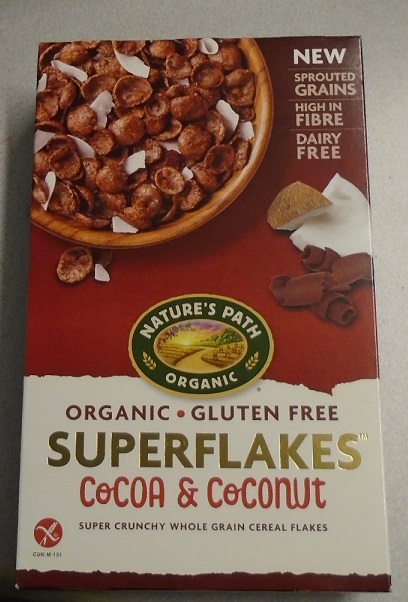 A BREAKFAST CEREAL CONTAINING SPROUTED GRAIN (BLACK BEAN FLOUR & BROWN RICE FLOUR), BROWN RICE FLOUR, DRIED COCONUT, COCONUT PALM SUGAR, HONEY, COCOA POWDER, AND SEA SALT. THEY HAVE THE APPEARANCE OF BROWN FLAKES AND ARE INTENDED TO BE EATEN WITH MILK. CONTAINED IN A CARDBOARD BOX WEIGHING 10 OUNCES (284 GRAMMES). PUT UP FOR RETAIL SALE.