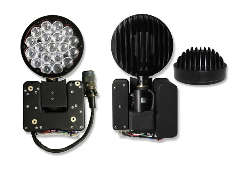 A LED LANDING/SEARCH LIGHT FOR AN AIRCRAFT
THE LIGHT CONSISTS OF A MOTORISED BODY USING BRUSHLESS MOTORS AND A CANOPY CONTAINING AN ARRAY OF WHITE LENSED LEDS.
THERE ARE ALSO IR LEDS FITTED.
INPUT VOLTAGE: 28 VDC NOMINAL 
MAX POWER: LED LIGHT - 120 W.
IR LAMPS - 10 W.
MOTORS - 150 W.
WEIGHT: 8.1LB MAX.
DIMENSIONS 295 MM X 159 MM X 91 MM.