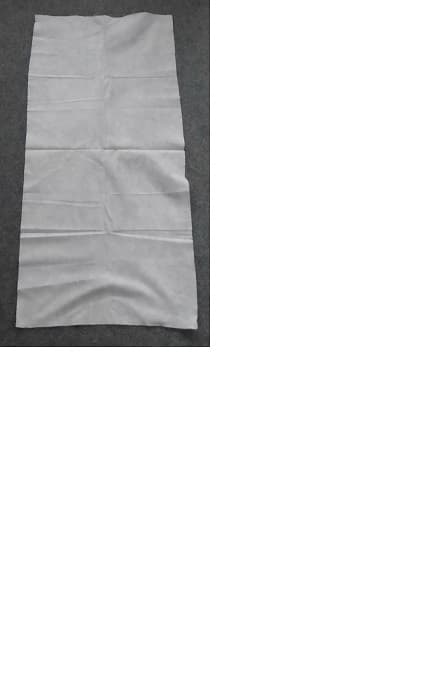 A BIODEGRADEABLE SINGLE USE BEAUTY TOWEL MADE FROM SPUNLACE NONWOVEN MATERIAL PRODUCED FROM VISCOSE RAYON FIBRES CONFIRMED AS 60 G/M2. INDIVIDUAL SAMPLE PROVIDED THOUGH THESE TOWELS ARE GENERALLY SUPPLIED IN BULK PACKS OF 500 TOWELS. SIZE: 84CM X 39CM. COLOUR: WHITE WITH EMBOSSED TEXTURE.