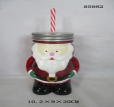 A GLASS DRINKING JAR WHICH INCLUDES A SCREW, TOP LID AND A HOLE IN THE TOP TO INSERT A DRINKING STRAW (STRAW INCLUDED). 
THE JAR IS IN THE SHAPE OF SANTA. 
MADE OF  GLASS 90%, METAL 7%, PLASTIC 2%, SILICONE 1%