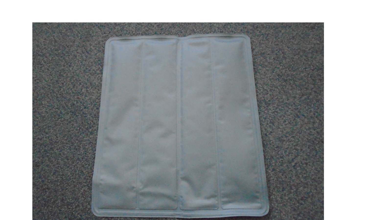 COOLING PILLOW PAD.  THE ITEM CAN BE PLACED IN A FRIDGE TO COOL (DO NOT FREEZE).  THE PRODUCT COVER IS PVC LAMINATED WITH POLYESTER FABRIC TO ENHANCE THE MATERIAL STRENGTH AND QUALITY.  THE LIQUID INSIDE THE MAIN MATERIAL IS 97.8688% WATER + 2% CARBOXYMETHYLCELLULOSE SODIUM.  THE ITEMS MAIN FUNCTION IS TO AID WITH MUSCULAR RELIEF BY SIMPLY PLACING THE PAD ON TO THE PILLOW AND RELAXING.