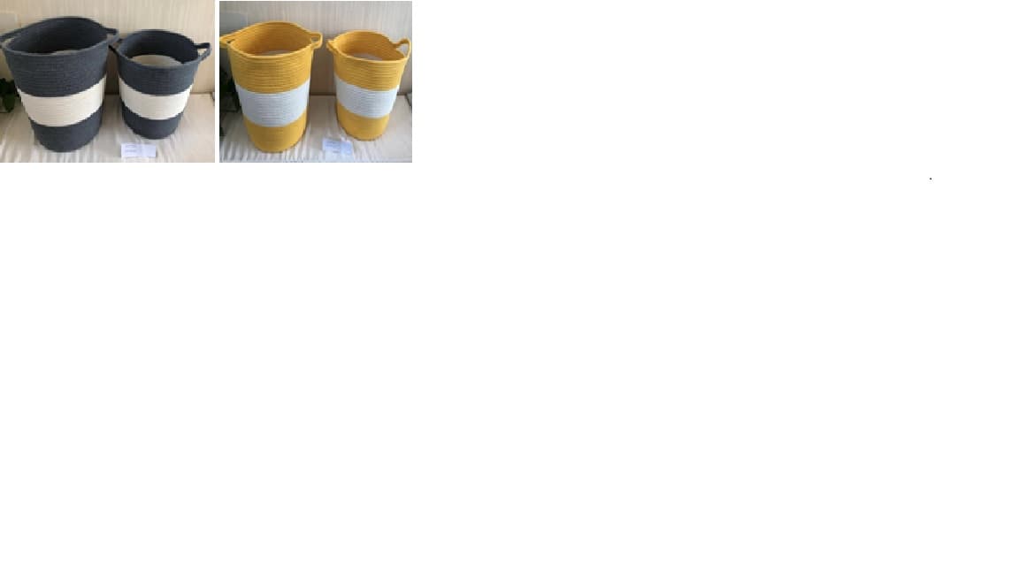 A SET OF TWO FOLDABLE BASKETS. MADE FROM ROPE. OF COTTON. WITH HANDLES. OF TWO COLOURS. (AVAILABLE IN YELLOW AND CREAM OR GREY AND CREAM). SIZE LARGE 35 X 35 X 35 AND MEDIUM 31 X 31 X 30 CMS.