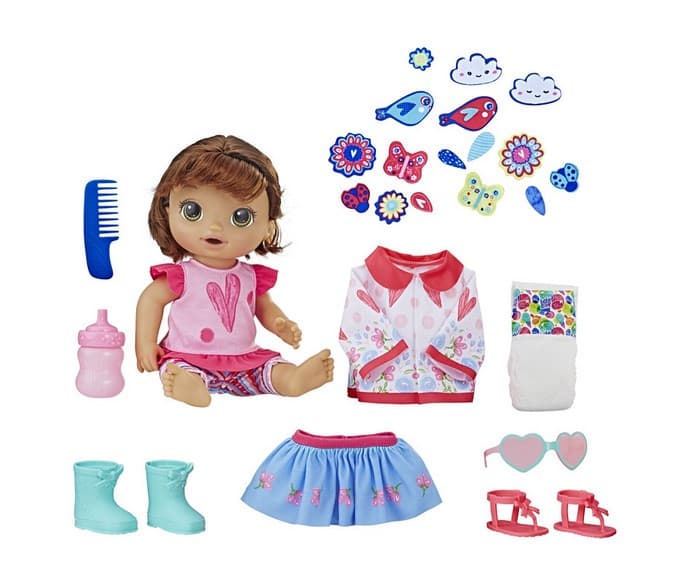 A PLASTIC DOLL WITH MOVEABLE LIMBS. PACKAGED WITH ACCESSORIES WHICH INCLUDE A REMOVABLE OUTIT, A SKIRT, A JACKET, A PAIR OF SHOES, A PAIR OF BOOTS, A DIAPER, A PAIR OF SUNGLASSES, A COMB, A BOTTLE AND 16 APPLIQUE PIECES, ALL OF WHICH ARE TO BE USED WITH THE DOLL. FULL INSTRUCTIONS INCLUDED. PACKAGED TOGETHER FOR RETAIL SALE.
