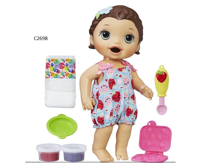 A PLASTIC DOLL WITH MOVEABLE LIMBS. PACKAGED WITH ACCESSORIES WHICH INCLUDE A DIAPER, 2 X ONE-OUNCE CONTAINER OF REUSABLE DOLL FOOD, 3 SMALL PLASTIC ACCESSORIES FOR USE ON THE DOLL. ONCE THE FOOD HAS BEEN FED TO HER THEN IT PASSES THROUGH INTO THE NAPPY. PROVIDED WITH FULL INSTRUCTIONS. PACKAGED TOGETHER FOR RETAIL SALE. REQUIRES 4 X AA BATTERIES. AIMED AT CHILDREN AGED 3 YEARS AND UPWARDS.