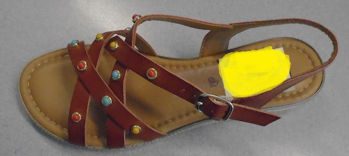 LADIES SANDAL WITH VAMP MADE OF STRAPS.  UPPER OF FAUX LEATHER (PLASTIC).  SANDAL IS BROWN IN COLOUR.  VAMP IS MADE OF FOUR CROSS OVER STRAPS 1.3 CMS WIDE.  ONE VAMP STRAP IS ATTACHED TO THE HEEL BACK STRAP AND ONE FASTENS TO THE BACK STRAP WITH AN ELASTICATED BUCKLE FASTENING.  PLASTIC COLOURED (BLUE, YELLOW AND ORANGE WITH GOLD EDGING) BEAD DECORATION TO VAMP STRAPS.  OUTER SOLE OF PLASTIC.  SANDAL HAS 1.2 CMS HIGH PLATFORM WITH DECORATIVE ROPE EFFECT.  2.8 CMS WEDGE HEEL HAS DECORATIVE ROPE EFFECT WITH GOLD PANEL.  PADDED INNER SOLE OF OTHER MATERIALS.  NOT COVERING THE ANKLE.  INSOLES OF A LENGTH 24 CMS OR MORE. THE SOLE AND HEEL COMBINED HAVING A HEIGHT OF LESS THAN 3 CMS.