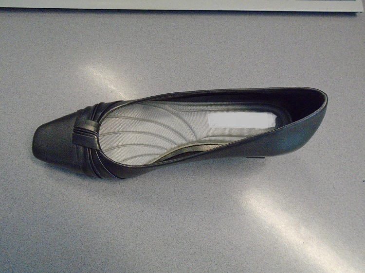 LADIES COURT SHOE.  SLIP ON STYLE.  UPPERS OF FAUX LEATHER (POLYURETHANE (PU) PLASTIC).  SHOE IS PEWTER IN COLOUR.  OUTER SOLE OF RUBBER.  KNOT DECORATION TO LOW CUT VAMP.  4 CMS HIGH CURVED SHAPED HEEL.  PADDED INSOLE FOR EXTRA COMFORT.  NOT COVERING THE ANKLE.  INSOLES OF A LENGTH 24 CMS OR MORE.