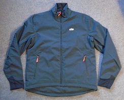 A WOVEN, PADDED, LINED WIND-JACKET FOR UNISEX. REACHING DOWN TO BELOW THE WAIST. ROUND NECK WITH HIGH STANDING COLLAR, COMPLETE FRONT OPENING WITH ZIP FASTENING. WITH LONG SLEEVES WITH KNITTED CUFF TIGHTENING AT SLEEVE ENDS. WITH DRAWSTRING TIGHTENING AT HEMMED BASE. WITH ZIP POCKETS ON LOWER FRONT. WITH PRINTED LOGOS ON LEFT CHEST. WITH ZIPPED POCKETS ON LOWER FRONT.  100% NYLON WITH A VISIBLE NON CELLULAR PLASTIC COATING ON THE INNER SURFACE.
