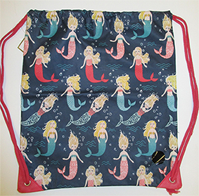 A DRAWSTRING OIL CLOTH GYM BAG DECORATED WITH MERMAIDS WITH COTTON CORDS WHICH ARE PULLED TO CLOSE THE OPENING. THE CORDS ALSO FIT OVER THE SHOULDER SO THAT THE BAG CAN BE CARRIED LIKE A RUCKSACK. IT HAS REINFORCED CORNERS WITH METAL EYELETS. THE BAG IS 100% COTTON AND IS PVC COATED. WITH A POLYESTER LINING. MEASURES 35CM X 40CM.