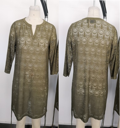 A KNITTED LACE BEACH COVER UP STYLE DRESS.  REACHING DOWN TO BELOW MID THIGH.  ROUND NECK WITH V CUT OUT AT FRONT OF NECKLINE. 3/4 LENGTH SLEEVES. SAID TO HAVE DOUBLE SIDE SEAM TIES WITH BEADS. 95% POLYESTER AND 8% ELASTANE