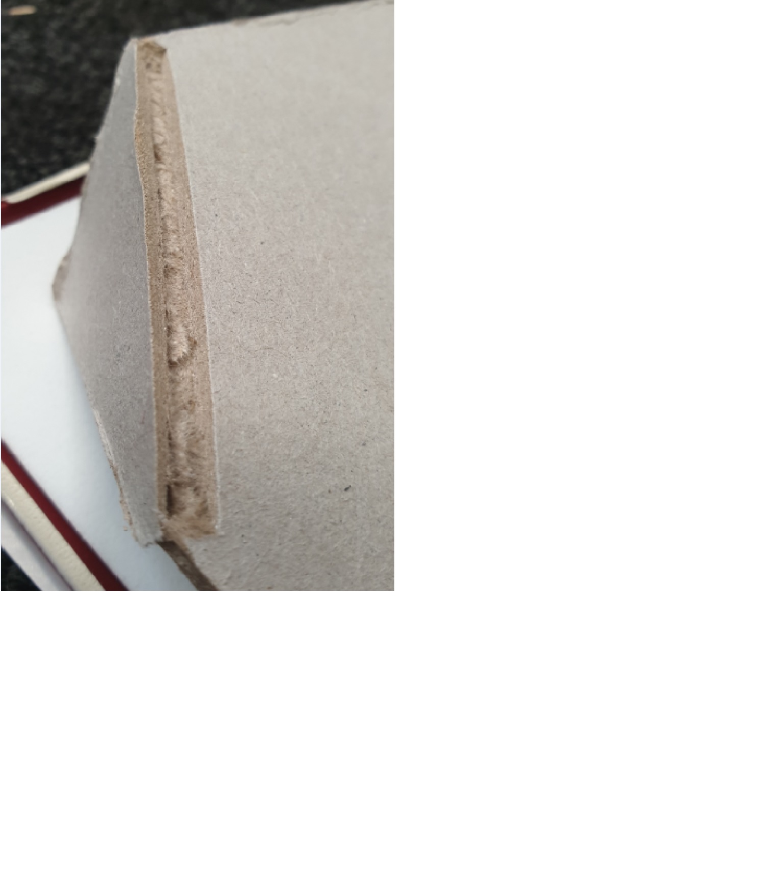 A RING BINDER MADE FROM A SEMI RIGID FIBRE BOARD SUBSTRATE 2.7MM THICK. COVERED IN A JACKET OF PVC 0.4MM IN THICKNESS. THERE IS A PVC FOAM COVER INSIDE (ONE SIDE) 2.0MM THICK MAKING THE PLASTIC CONSTITUTE MORE THAN HALF THAN THE TOTAL THICKNESS.