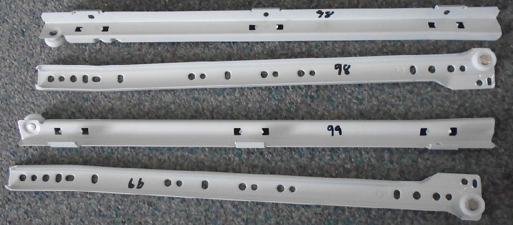 METAL DRAW SLIDERS, COATED IN EPOXY WITH PLASTIC WHEELS. HOLDS THE DRAW IN PLACE AND ALLOWS EASY SLIDE OPENING. FIXED IN PAIRS.