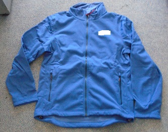 KNITTED POLYESTER JACKET WITH THE FEATURES OF A WINDJACKET. IT HAS A ZIP FASTENING AT THE FRONT, A HIGH CLOSE FITTING NECKLINE, AND TWO ZIP POCKETS AT THE HIPS. THE LOWER PART OF THE GARMENT HAS A DRAWSTRING WITH A TOGGLE FOR TIGHTENING. DARK BLUE IN COLOUR WITH A LOGO TO THE UPPER LEFT. FOR MEN, BUT THERE IS NO LEFT OVER RIGHT FASTENING, SO CLASSIFIED AS UNISEX.