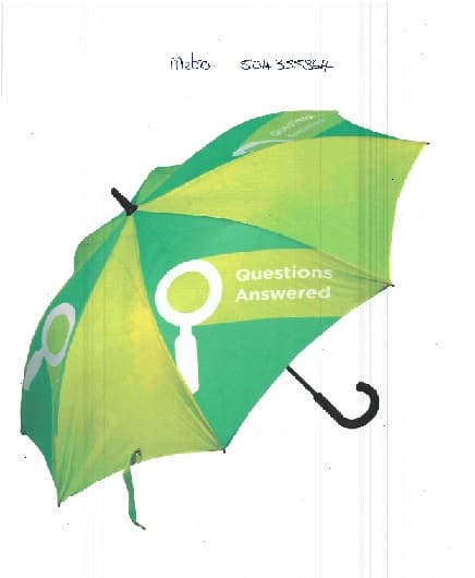 BESPOKE WALKING LENGTH UMBRELLA WITH CROOK HANDLE MADE OF PLASTIC. AUTOMATIC OPENING AND FIBREGLASS SHAFT, FIBREGLASS RIBS. POLYESTER CANOPY. UMBRELLA IS IN LIGHT AND DARK GREEN ALTERNATING AROUND THE CANOPY WITH A WHITE MAGNIFYING GLASS ON IT AND THE WORDS QUESTIONS ANSWERED ON IT.