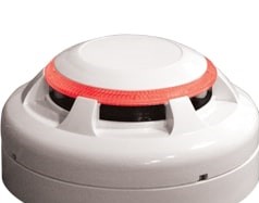 ANALOGUE-ADDRESSABLE OPTICAL SMOKE DETECTOR, UTILISING THE LIGHT SCATTER SENSING PRINCIPLE, USING A LIGHT EMITTING DIODE & A PHOTODIODE WITHIN ITS SENSING CHAMBER. IT COMPRISES A PLASTIC (ABS-TYPE) CASING CONTAINING METAL FASTENINGS & CONNECTING TERMINALS PLUS A POPULATED CIRCUIT BOARD WITH THE SENSING CHAMBER ATTACHED. WHEN SMOKE ENTERS THE SENSING CHAMBER, THE PHOTODIODE SENSES INCREASED LEVELS OF INFRA-RED LIGHT SCATTERED BY THE SMOKE PARTICLES; THE DETECTOR THEN GOES INTO ALARM MODE.THE 360-DEGREE OMNIVIEW LIGHT EMITTING DIODE (LED) SERVES ONLY TO INDICATE WHEN THE DETECTOR IS BEING POLLED BY ITS CONTROL PANEL OR TO SHOW THAT THE DETECTOR IS IN ALARM MODE. IT IS INTENDED ONLY TO TRIGGER AN ALARM CONDITION UPON THE DETECTION OF SMOKE. THIS PRODUCT CANNOT BE USED ON A STAND-ALONE BASIS IT CAN ONLY BE USED AS PART OF A NITTAN ANALOGUE-ADDRESSABLE FIRE ALARM CONTROL SYSTEM AND CANNOT BE RESOLD AS AN OFF-THE-SHELF PRODUCT IN GENERAL STORES OR BY ANY NON-SPECIALIST OUTLET. THIS PRODUCT DOES NOT HAVE AN INTEGRAL SOUNDER OR RECORDING DEVICE. THE UNIT CAN BE SOLD SINGLY BUT IT IS MORE COMMONLY DESPATCHED IN LARGER CARDBOARD BOXES CONTAINING 10 OR 100 UNITS.