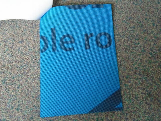 A NON-WOVEN TEXTILE CONSISTING OF THREE LAMINATED LAYERS. 

THE FIRST LAYER IS A NON WOVEN SPUNBOND OF STAPLE FIBRES OF POLYPROPYLENE TEXTILE, BLUE IN COLOUR WITH BLACK TEXT.

THE CENTRAL LAYER IS A PLASTIC FILM MADE OF POLYPROPYLENE.

THE THIRD LAYER IS A NON WOVEN SPUNBOND OF STAPLE FIBRES OF POLYPROPYLENE TEXTILE BLACK IN COLOUR.

A TOTAL WEIGHT RANGING FROM 90 TO 150 GRAMS PER METRE SQUARED.
IT IS PRESENTED/ PACKAGED IN ROLLS  1.0 X 25M, 1.0 X 50M , 1.5 X 50M, 1.0X2500 AND 1.5X2500M APPROX.