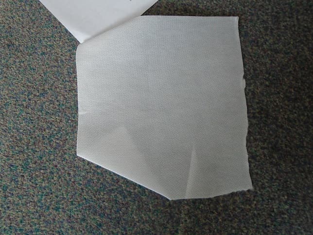 A NONWOVEN TEXTILE MADE FROM SPUNBOND MANMADE BI-COMPONENT POLYETHYLENE/POLYPROPYLENE FILAMENTS. WHITE IN COLOUR. 100GSM SQUARED. IN ROLLS OF 1.56 X 2000 LINEAR METRES APPROX.