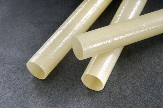 EPOXY AND WOVEN GLASS FIBRE SPIRAL ROUND TUBES. THE TUBES ARE RIGID AND CAN BE USED UP TO TEMPERATURES OF 180 DEGREES C