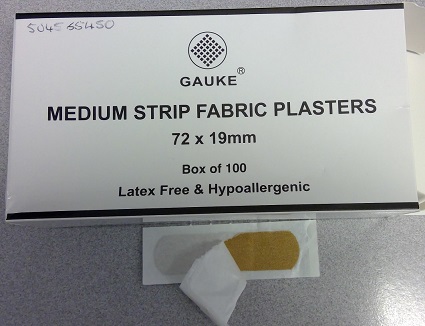 FABRIC DRESSING ADHESIVE PLASTERS, RECTANGULAR MEDIUM STRIP 72 X 19MM
DESIGNED TO FIT DIFFERENT AREAS OF THE BODY. FOR MEDICAL PURPOSES.
THE PLASTER IS AN ELASTIC FIBRE BASED WOVEN FABRIC. WITH A CENTRAL ABSORBENT GAUZE PAD DESIGNED TO BE PLACED OVER A WOUND. LATEX FREE & HYPOALLERGENIC. THEY ARE WRAPPED IN A STERILE WHITE PAPER SLEEVE. THE PLASTERS HAVE A CENTRAL ABSORBENT GAUZE PAD AND A TWO PART RELEASE PAPER SITUATED ON THE REVERSE OF THE PLASTER WHICH IS IN CONTACT WITH THE ADHESIVE LAYER, THESE ARE REMOVED WHEN APPLIED TO THE SKIN. PRESENTED IN A WHITE & BLACK DETAIL CARDBOARD BOX OF 100 PLASTERS.