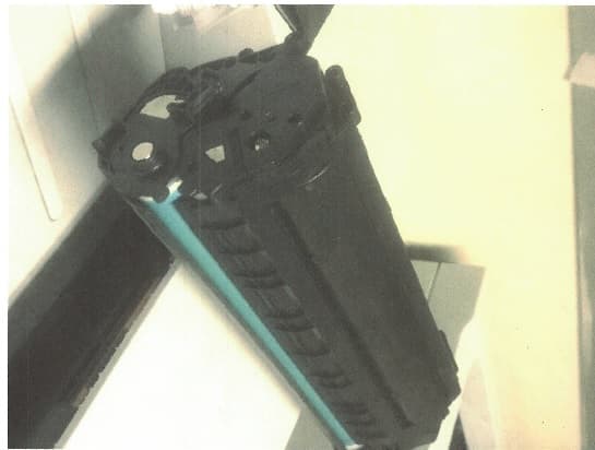 A PRINTER TONER CARTRIDGE. IT IS MADE OF POLYETHYLENE (PE) PLASTIC AND CONTAINS A DYE INK AND/OR TONER POWDER. IT IS USED TO PRINT ON PAPER.