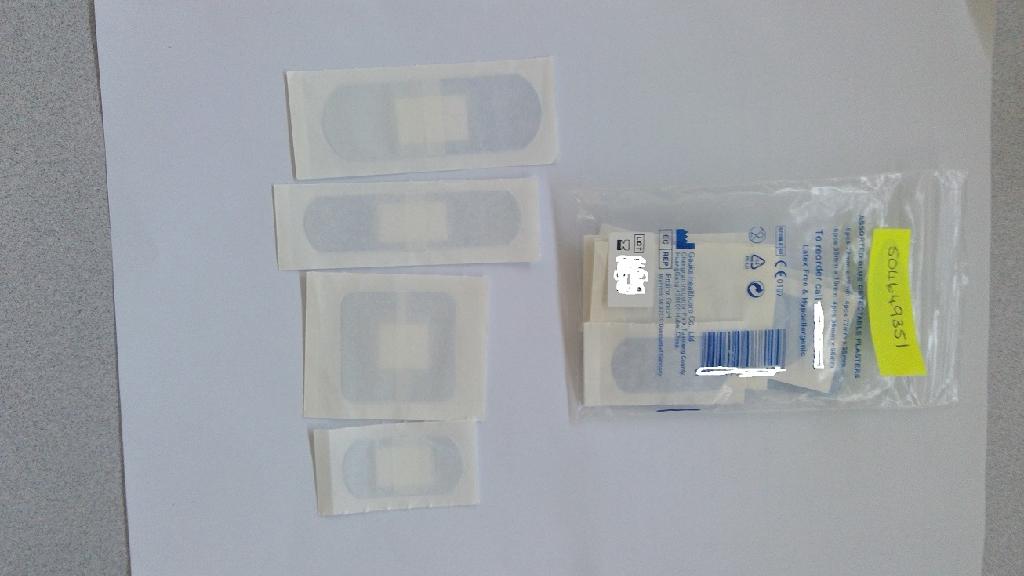 PE (POLYETHYLENE) BLUE DETECTABLE ADHESIVE PLASTERS, IN VARIOUS SHAPES AND SIZES. 
DESIGNED TO FIT DIFFERENT AREAS OF THE BODY. FOR MEDICAL PURPOSES. THE PLASTERS ARE COLOURED A DISTINCTIVE BLUE FOR EASE OF DETECTION. 
THE PLASTER IS A POLYETHYLENE BASE MATERIAL WITH A CENTRAL ABSORBENT GAUZE PAD DESIGNED TO BE PLACED OVER A WOUND. LATEX FREE & HYPOALLERGENIC. THEY ARE WRAPPED IN A STERILE WHITE PAPER SLEEVE. THE PLASTERS HAVE A CENTRAL ABSORBENT GAUZE PAD AND A TWO PART RELEASE PAPER SITUATED ON THE REVERSE OF THE PLASTER WHICH IS IN CONTACT WITH THE ADHESIVE LAYER, THESE ARE REMOVED WHEN APPLIED TO THE SKIN. PRESENTED IN A POLYTHENE ZIP LOCK BAG 13 CM X 8 CM. CONTAINING APPROXIMATELY 20 ASSORTED PLASTERS FOR RETAIL SALE.
