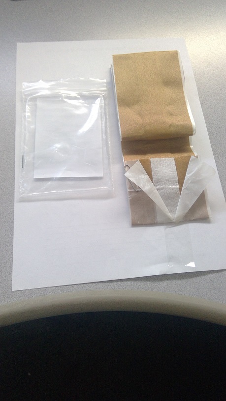 WOVEN FABRIC DRESSING STRIP, (PLASTER) MADE IN ONE CONTINUOUS LENGTH OF 7.5CM X 1 METRE. THE DRESSING IS BEIGE IN COLOUR. THE PLASTER IS AN ELASTIC FIBRE BASED WOVEN FABRIC, WITH A CENTRAL ABSORBENT GAUZE PAD DESIGNED TO BE CUT TO AN APPROPRIATE LENGTH TO BE PLACED OVER A WOUND. LATEX FREE & HYPOALLERGENIC. THE DRESING STRIP HAS A CENTRAL ABSORBENT GAUZE STRIP THE FULL LENGTH OF THE PLASTER, WITH A TWO-PART RELEASE PAPER SITUATED ON THE REVERSE WHICH IS IN CONTACT WITH THE ADHESIVE LAYER, THESE ARE REMOVED WHEN APPLIED TO THE SKIN. PRESENTED IN A POLYTHENE ZIP LOCK BAG 13 CM X 8 CM, FOR RETAIL SALE.