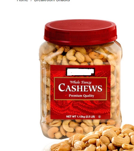 A 1.13 KG JAR OF WHOLE ROASTED CASHEW NUTS. THESE NUTS HAVE BEEN OIL ROASTED AND SEASONED WITH SALT.
